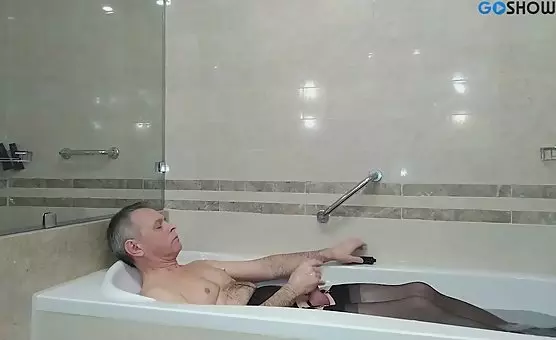Self Pleasure with Stockings and Water in Tub
